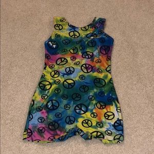 Cute rainbow leotard with peace signs!